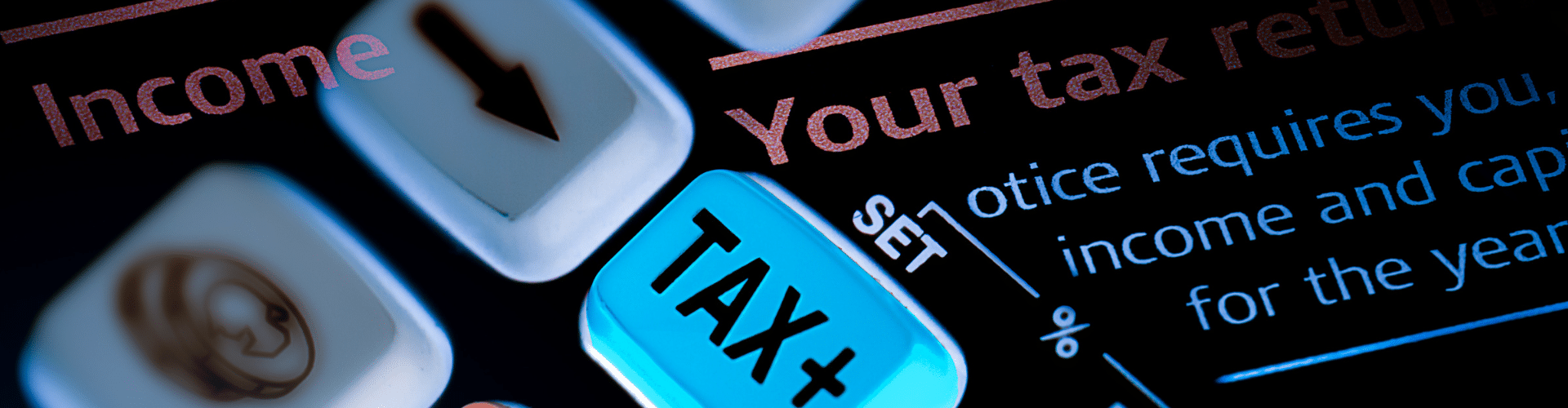 Digital tax return concept with 'TAX+' key highlighted, symbolizing income tax processing and IRS filing